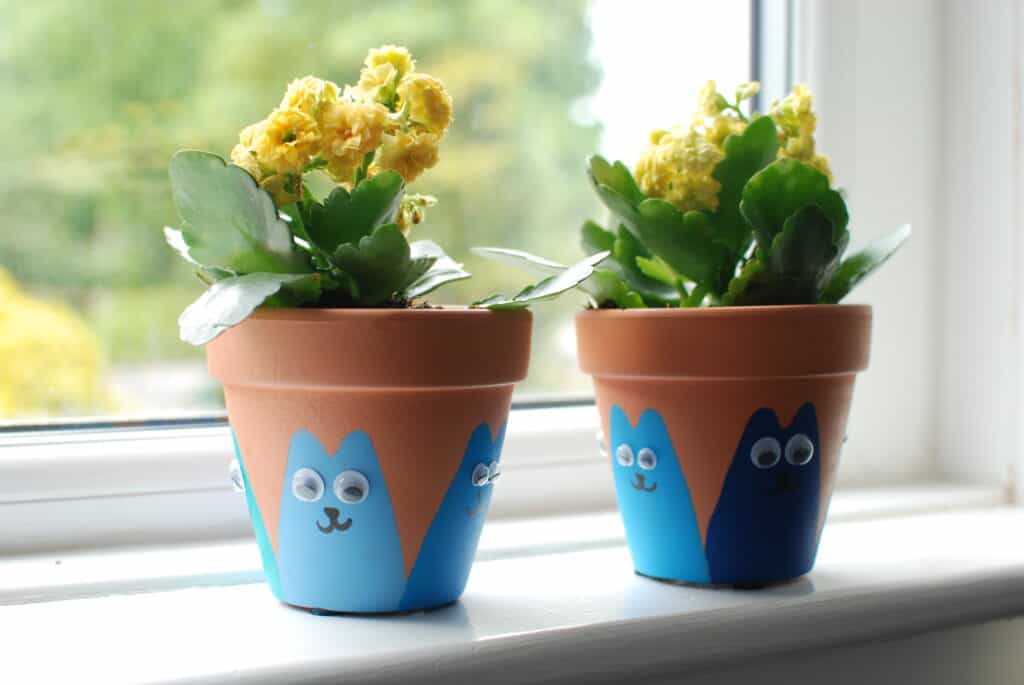 Cats I'm loving my diy painted cat plant pots